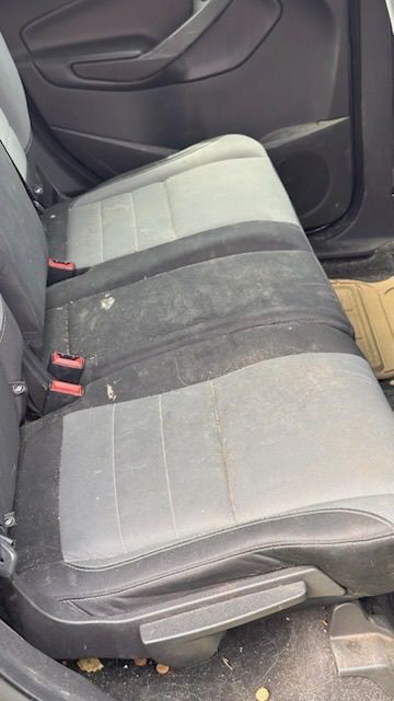 Before: stained car seats — San Diego auto detailing