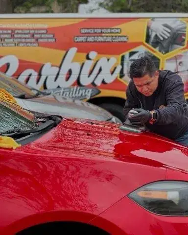 Ceramic coating applied to a red sports car