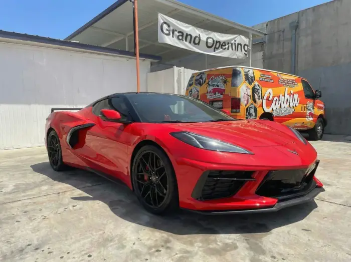 Red Corvette C8 at the Carbix grand opening