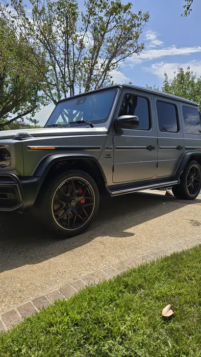 Grey Mercedes-Benz G-Class in profile after a full detail